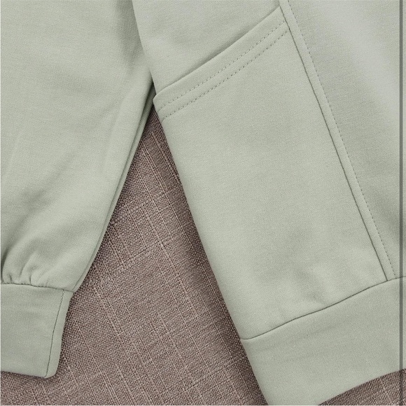 Green top with Frog Design and white collar - Picture 5 of 7